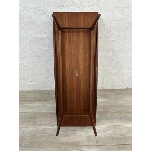 1195 - A mid 20th century Gordon Russell teak coffee table - approx. 40cm high x 45cm wide x 120cm long