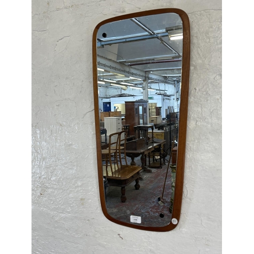 1196 - A mid 20th century teak framed wall mirror - approx. 73cm x 35cm