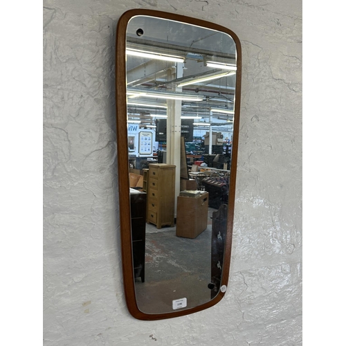 1196 - A mid 20th century teak framed wall mirror - approx. 73cm x 35cm