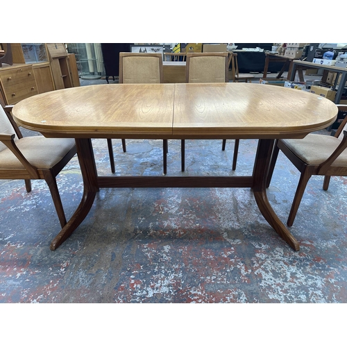 1199 - A mid 20th century Nathan teak extending dining table and six chairs - approx. 74cm high x 104cm wid... 