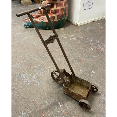 1201 - A vintage Suffolk 64 cast iron line marker