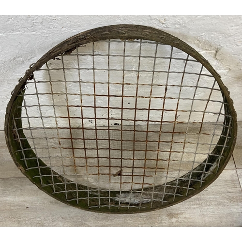 1203 - Three vintage wood and wired metal sieves