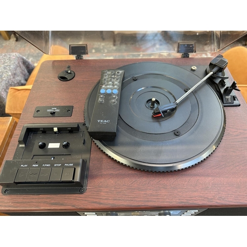 1501 - A Teac LP-R500 music centre comprising three-speed turntable, cassette player, CD recorder and two-b... 