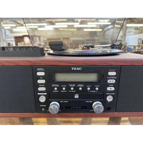 1501 - A Teac LP-R500 music centre comprising three-speed turntable, cassette player, CD recorder and two-b... 