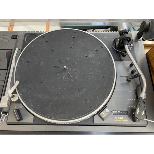 1502 - A vintage Hitachi SDT-300 music centre comprising two-speed belt drive turntable, Dolby cassette rec... 