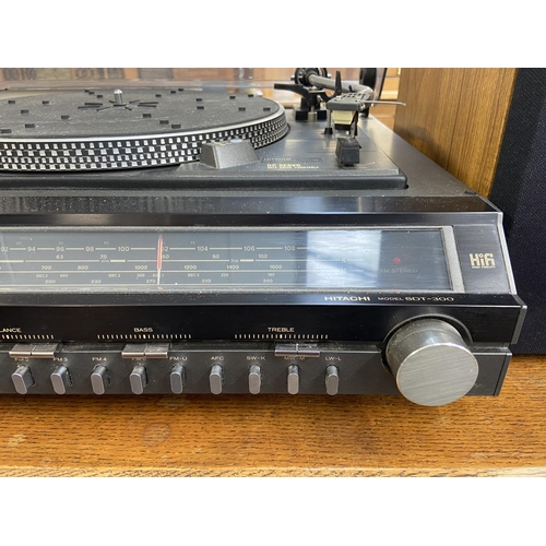 1502 - A vintage Hitachi SDT-300 music centre comprising two-speed belt drive turntable, Dolby cassette rec... 