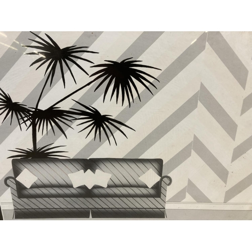 1214 - A 1980s framed Modernist black and white print of a sofa and plant - approx. 53cm high x 53cm wide