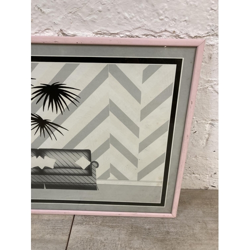 1214 - A 1980s framed Modernist black and white print of a sofa and plant - approx. 53cm high x 53cm wide