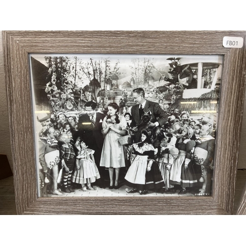 1215 - Four framed black and white photographs from the 'Wizard of Oz' film - approx. 25cm high x 30cm wide