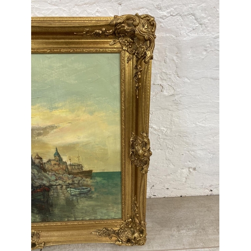 1221 - A late 20th century gilt framed Impressionist style oil on canvas of boats in a harbour - approx. 64... 