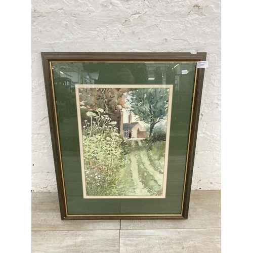 1232 - A late 20th century framed F. Shenton watercolour of a garden scene titled 'Hogweed' - approx. 67cm ... 