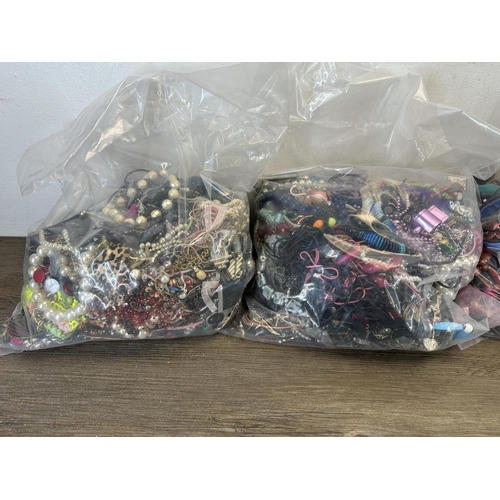 1378 - Five bags of costume jewellery