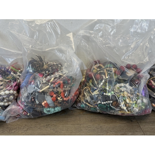 1378 - Five bags of costume jewellery