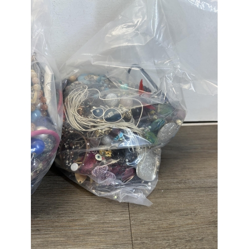 1379 - Five bags of costume jewellery