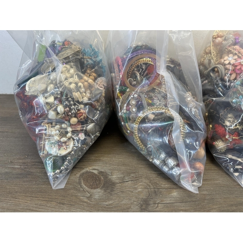 1381 - Five bags of costume jewellery