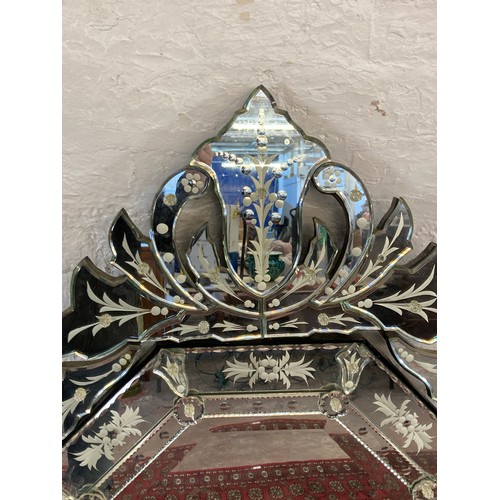 1245 - A Victorian style etched bevelled edge decorative wall mirror - approx. 139cm high x 60cm wide