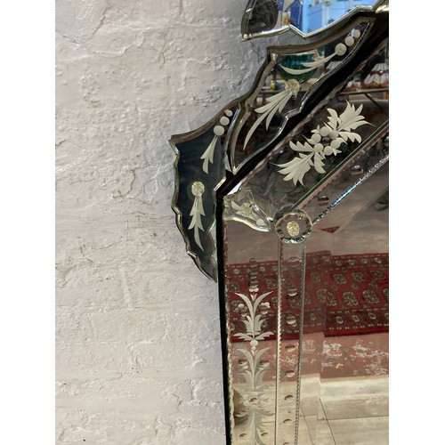 1245 - A Victorian style etched bevelled edge decorative wall mirror - approx. 139cm high x 60cm wide