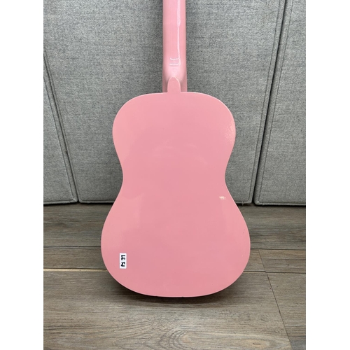 1514 - A Ready Ace pink and purple child's steel strung acoustic guitar