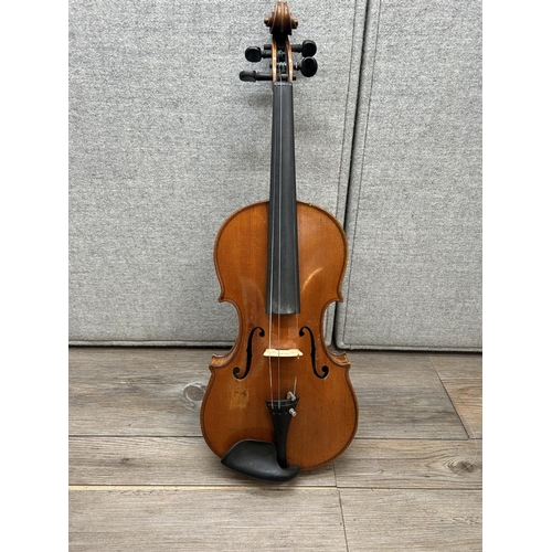 1517 - A cased vintage unlabelled violin with bow