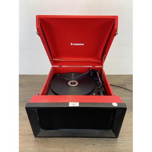 1486 - A Steepletone SRP1R portable record player fitted with Crosley Stack-O-Matic three-speed autochanger... 