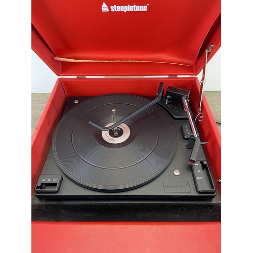 1486 - A Steepletone SRP1R portable record player fitted with Crosley Stack-O-Matic three-speed autochanger... 