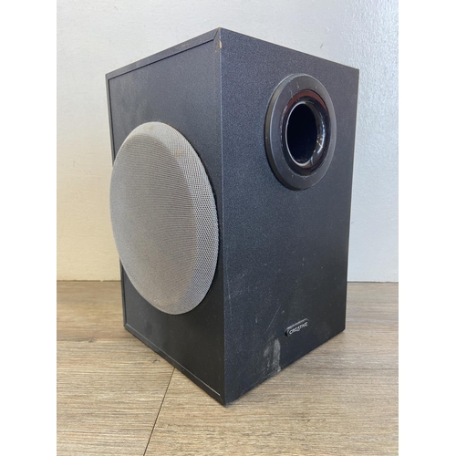 1489 - Six Creative speakers to include Inspire M2600, Active 
I-Trigue 2.1 subwoofer with bass level contr... 