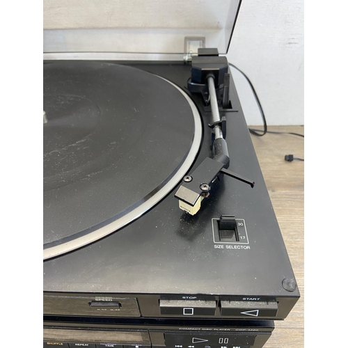 1495 - Four items of hi-fi, one Sony PS-LX45P two-speed fully automatic turntable, one Sony CDP-M20 CD play... 