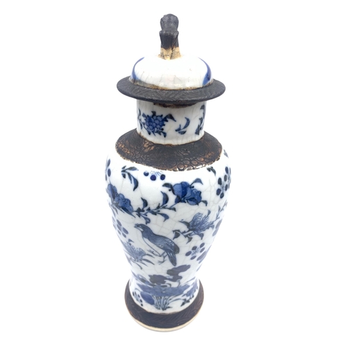 1250 - Two Chinese crackle glazed blue and white porcelain vases - approx. 28cm high