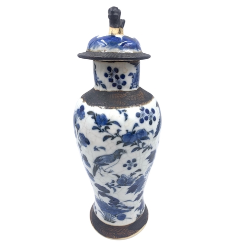 1250 - Two Chinese crackle glazed blue and white porcelain vases - approx. 28cm high