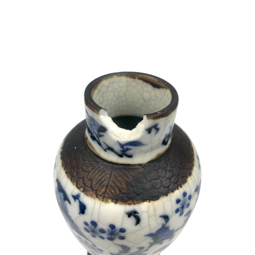 1250 - Two Chinese crackle glazed blue and white porcelain vases - approx. 28cm high