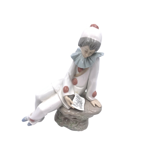 1260 - Four Nao by Lladro porcelain figurines - largest approx. 24cm high