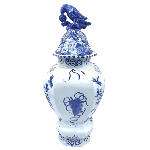 1261 - An antique Delftware blue and white ceramic jar and cover with bird finial - approx. 46cm high