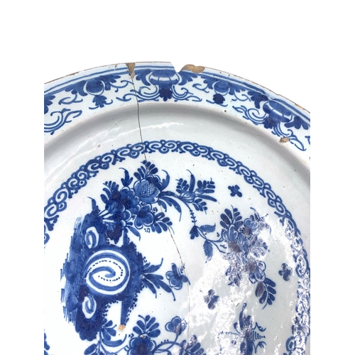 1262 - An 18th century Delftware blue and white ceramic charger - approx. 34cm diameter