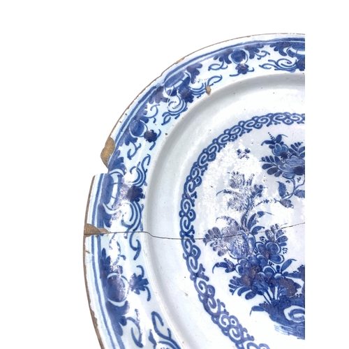 1262 - An 18th century Delftware blue and white ceramic charger - approx. 34cm diameter