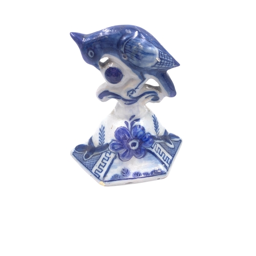 1263 - An antique Delftware blue and white ceramic jar and cover with bird finial - approx. 32cm high