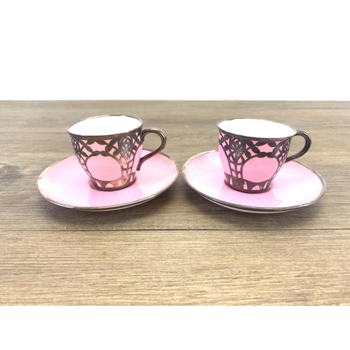 1265 - An early 20th century The Paragon China pink glazed ceramic fifteen piece coffee set with white meta... 