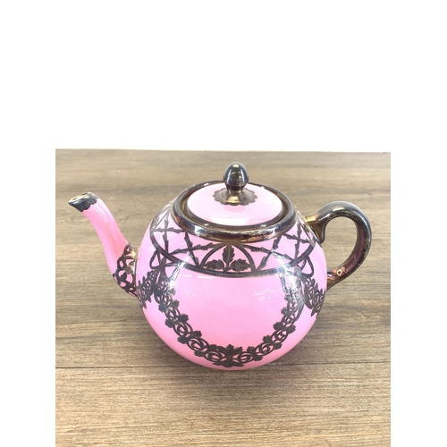 1265 - An early 20th century The Paragon China pink glazed ceramic fifteen piece coffee set with white meta... 