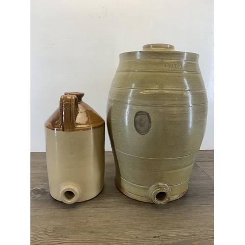 1268 - Two pieces of early 20th century stoneware pottery, one barrel decanter - approx. 46cm high and one ... 