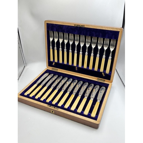 A walnut cased Marples & Co hallmarked Sheffield silver bone handled twenty four piece fish cutlery set, dated 1907 - approx. gross weight 1192g including handles