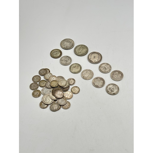 2291 - A collection of British silver coins to include two 92.5% silver florins, five 92.5% silver shilling... 