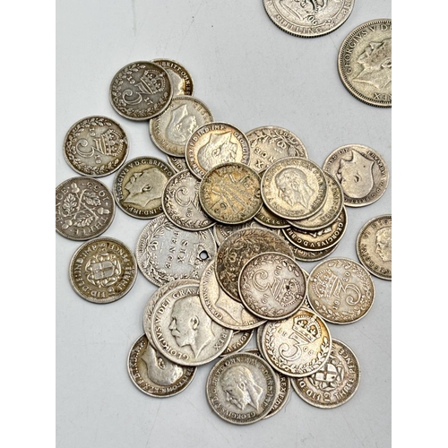 2291 - A collection of British silver coins to include two 92.5% silver florins, five 92.5% silver shilling... 