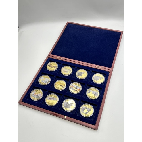 2293 - A cased set of twelve Windsor Mint 75th Anniversary of the Second World War gold plated proof coins