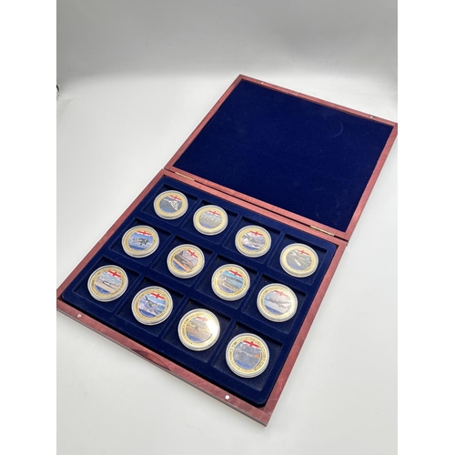 2294 - A cased set of twelve Windsor Mint British Military Aircraft gold plated proof coins