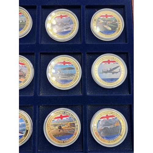 2294 - A cased set of twelve Windsor Mint British Military Aircraft gold plated proof coins