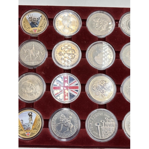 2296 - Twenty four British commemorative coins