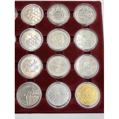 2296 - Twenty four British commemorative coins