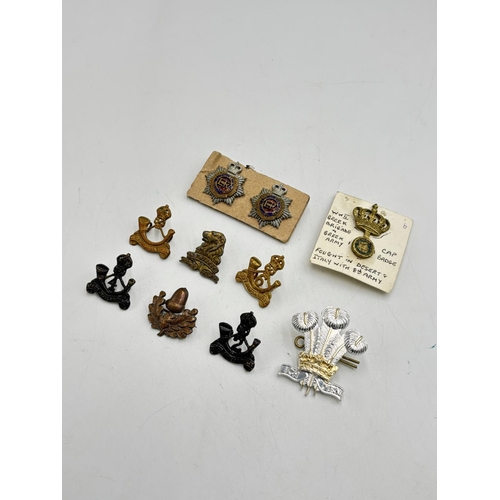 2366 - Ten military cap badges