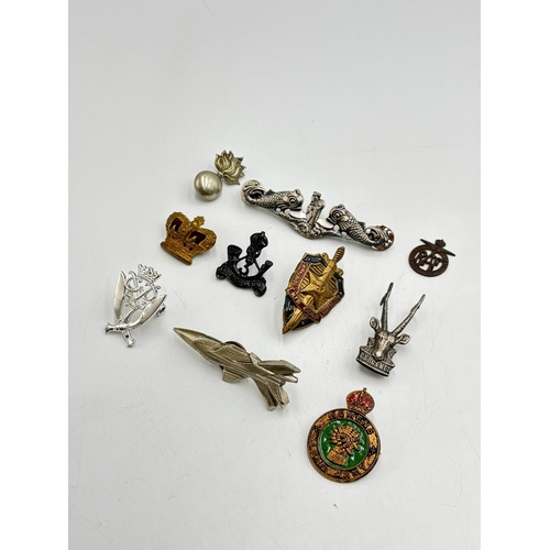 2368 - Ten military cap badges