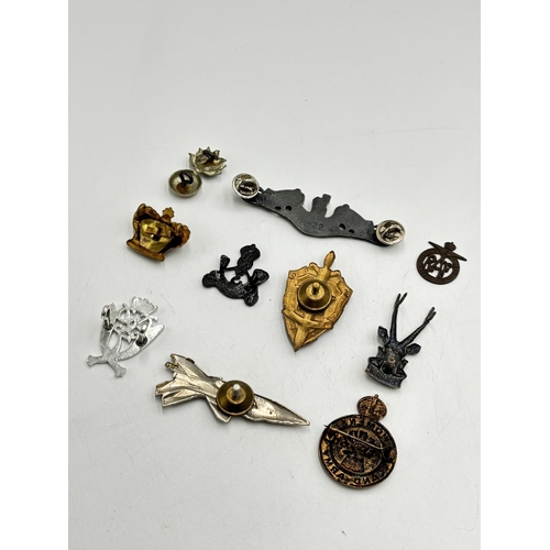 2368 - Ten military cap badges