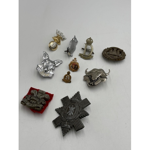 2370 - Ten military cap badges